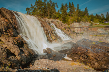Fototapeta na wymiar Duży wodospad Haugfossen na rzece Simoa, Amot, Norwegia