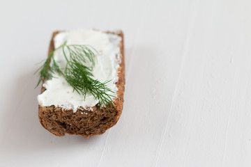 Healthy delicious sandwiches with rye bread and seasonal vegetables and cottage cheese for breakfast. With space for text