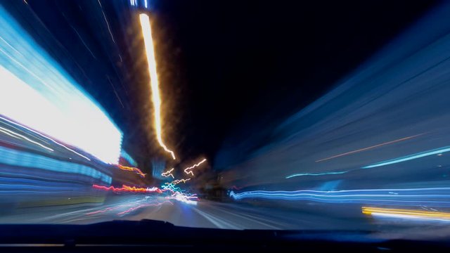 View from speeding car at night, Okinawa Prefecture, Japan