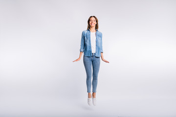 Photo of full length size cheerful excited lady raising up in air having toothy beaming smile...