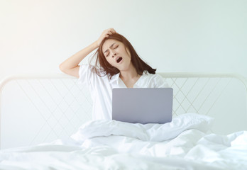 Women working sleepy computer.