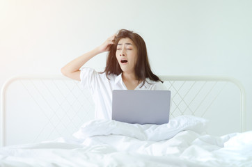 Women working sleepy computer.