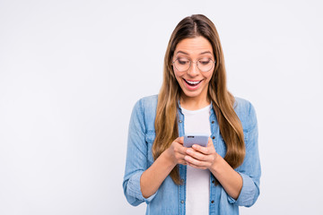 Photo of funny funky lady using her interesting digital gadget isolated grey background