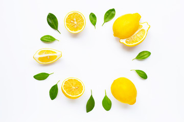 Fresh lemon with leaves isolated on white