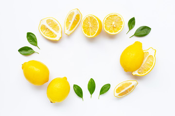 Fresh lemon with leaves isolated on white