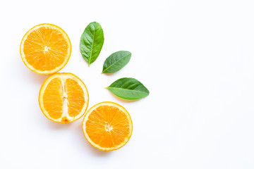 High vitamin C, Juicy and sweet. Fresh orange fruit with green leaves  on white.