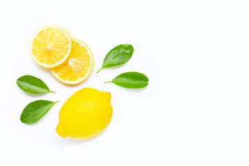 Lemon and slices with leaves isolated on white. Copy space