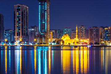 Fototapeta na wymiar Sharjah skyline at night, United Arab Emirates