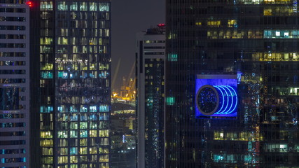 Skyscrapers aerial view in downtown and financial district Dubai night timelapse, United Arab Emirates