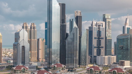 Fototapeta na wymiar Aerial view of skyscrapers and road junction in Dubai timelapse