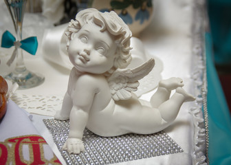 Elements of the wedding ceremony. Wedding decorations. Figurine angel