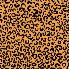 Seamless black and orange fashion leopard animal print vector