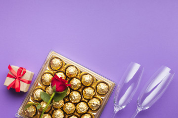 Flat lay frame with chocolate box and gift