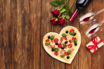Fototapeta na wymiar Top view romantic table setting with pizza