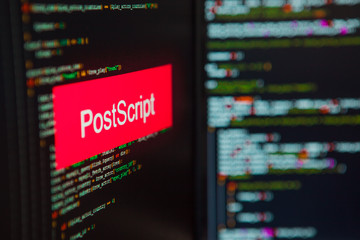 Programming language, PostScript inscription on the background of computer code.