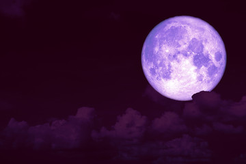 Naklejka na ściany i meble purple strawberry moon back on silhouette heap cloud on sunset sky