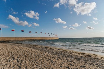 Europe country flags swinging saw at harbour of Helsingborg, Sweden