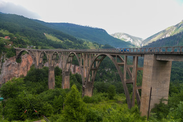 Fototapeta na wymiar Famous Durdevica Tara Bridge over the Tara River in northern Montenegro, Zabljak