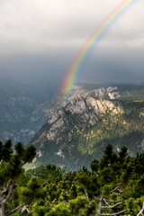 vertical view of rainbow in the mountains panoramic view of Montenegro mountains in Durmitor park