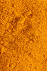 Macro close-up of turmeric powder