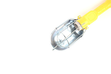 Generic Portable hand Maintenance Work lamp With Hook and metal protective. A plastic handle and electrical wire is yellow color. Use with E27 type bulb. Isolated on black background.