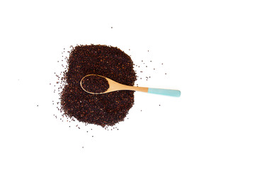 Raw brown seeds quinoa closeup isolated at white background