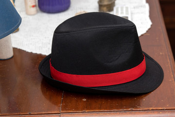 black hat with red band for wedding