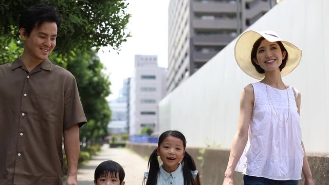 Family spending&not;&dagger;time outdoors, Minato, Tokyo, Japan
