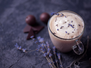 Homemade Cappuccino raf coffee with lavender . Cozy Breakfast. Lavender flowers and chocolate