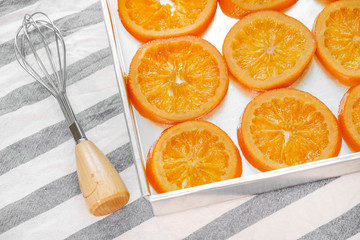Compote orange sliced on tray