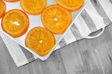 Compote orange sliced on tray