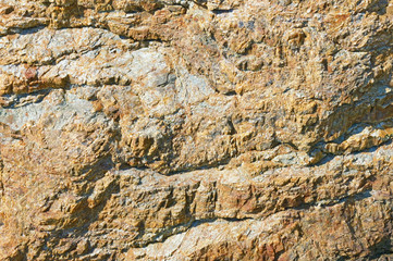 Texture of mountain cliff on a sunny day, background. Montenegro, Dinaric Alps