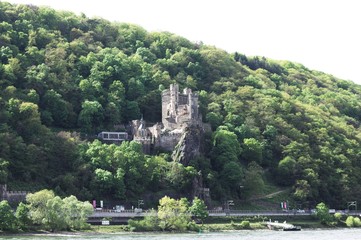 Fototapeta na wymiar Rheinstein Castle, Germany - 27 April 2019: View of the Castle in the hill Over the Rhine river