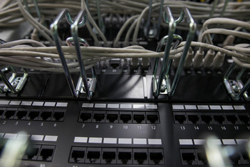 Fiber Optical connector interface. Fibre Channel swich. Severs computer in a rack at the large data center.