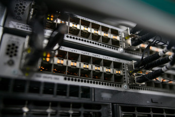 Fiber Optical connector interface. Fibre Channel swich. Severs computer in a rack at the large data center.