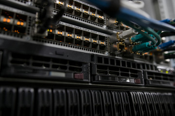 Fiber Optical connector interface. Fibre Channel swich. Severs computer in a rack at the large data center.