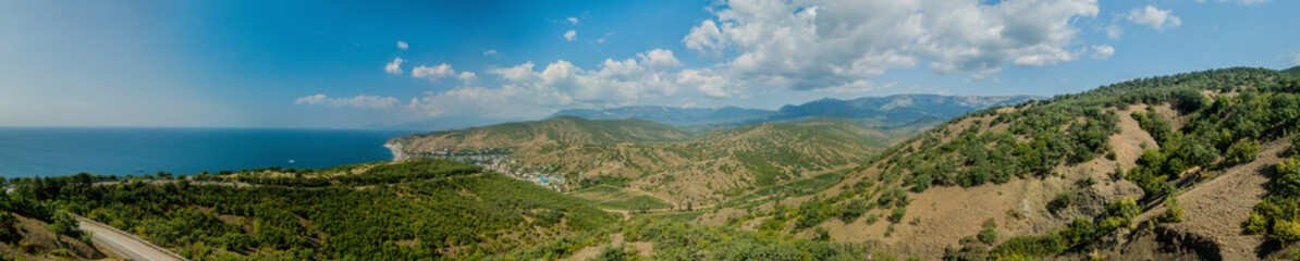 Fototapeta na wymiar Crimea landscape: high resolution panoramic view of seaside resort city, mountains and hills