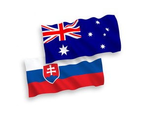 National vector fabric wave flags of Australia and Slovakia isolated on white background. 1 to 2 proportion.