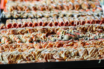 sushi shellfish and shrimp and seafood and varitys on street food in pattaya city of thailand