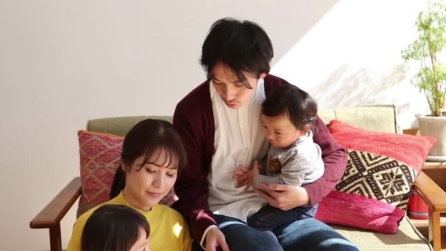 Parents playing with children