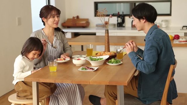 Close&not;&dagger;up&not;&dagger;of family having healthy dinner