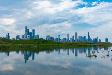 Fototapeta na wymiar Chicago Skyline Reflected on a Pond at Northerly Island