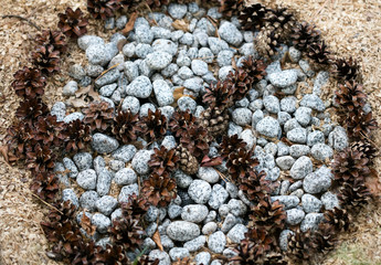 Peace symbol with stones and pines cones macro background fine art in high quality prints products...