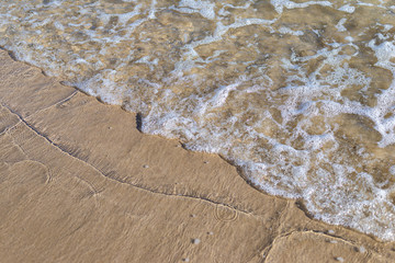 Fototapeta na wymiar Sea water beach and sand