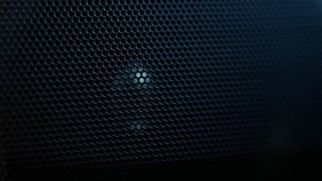 Metal speaker mesh with moving light