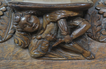 A misericord in Wells Cathedral Somerset England