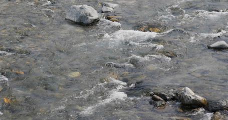 River lake stream over the pebble stone