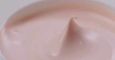 Cosmetics lotion cream in pink colour