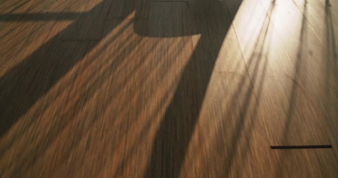 Timelapse, Shadow and light on the parquet flooring. Floorlamp, curtains  shadowing  Wooden floor.