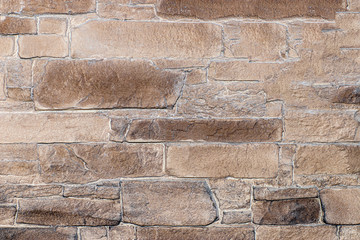 The texture of natural stone is made like brickwork. It has beautiful shades and shapes of stone.